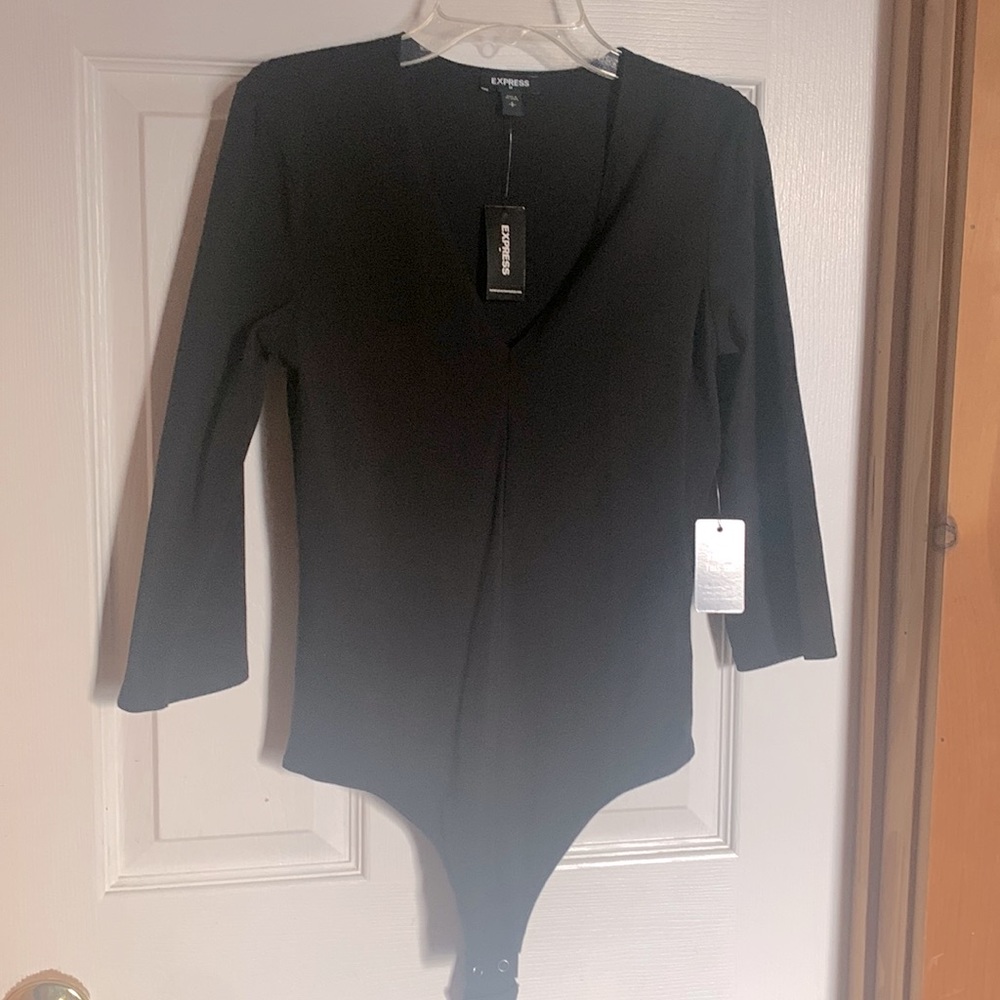 Black V-neck bodysuit from Xpress. Tag still on!